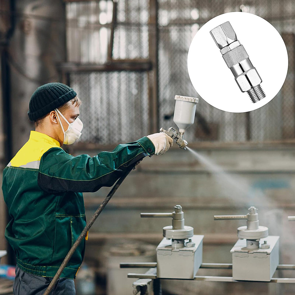Person using a spray gun in an industrial setting with a close-up of a spray nozzle.